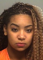 Woman charged in crash that killed pedestrian, passenger